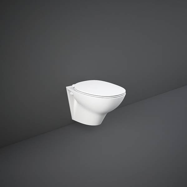 Rak - Wc sospeso bianco alpino serie Morning con coprivater rallentato e tecnologia Rimless